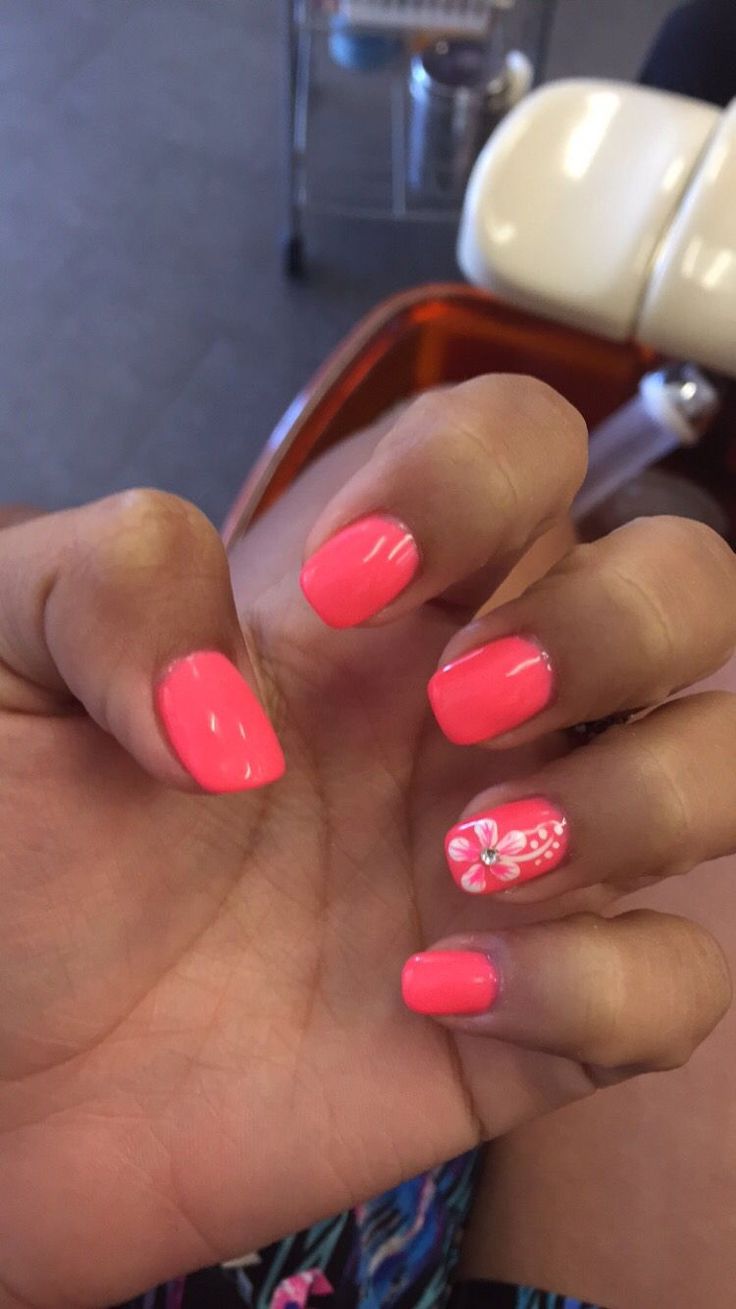 Playful Vibrant Pink Summer Nail Design with Floral Accent and Glossy Finish