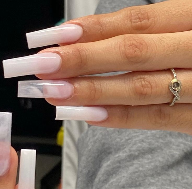 Ombre Elegance: Long Acrylic Nails in Soft Pink and Clear with Glossy Finish.