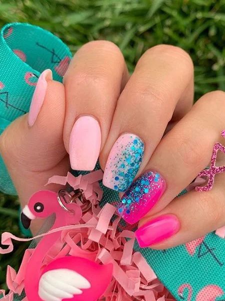 Vibrant Pink and Blue Summer Nail Design with Glittery Accents