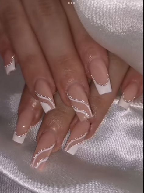 Chic Nude Nail Design with Delicate White Waves and Sparkling Accents