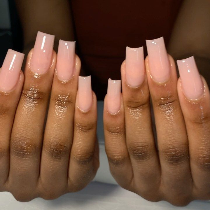 Elegant Glossy Nude Acrylic Nails: A Timeless, Sophisticated Design for Any Occasion.