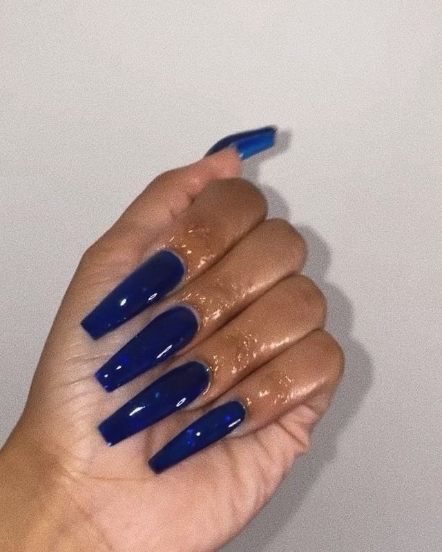 Striking Bold Blue Nails: A Chic and Elegant Statement for Any Occasion.