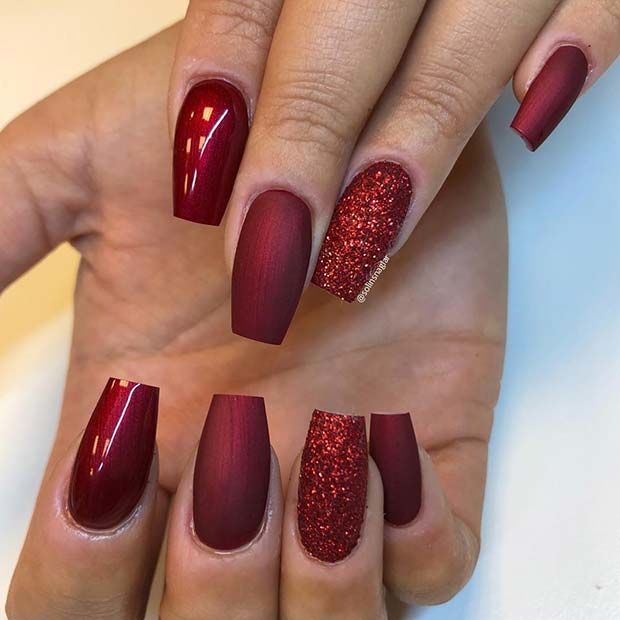 Elegant Red Matte Nail Design with Glitter Accent.