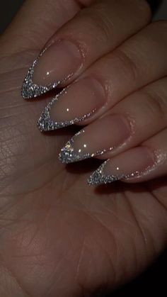 Glamorous Elegant Stiletto Nails with Sparkling Silver Tips for a Striking Look