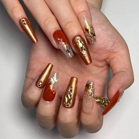 Autumn-Inspired Elegant Nail Design with Warm Colors and Textures