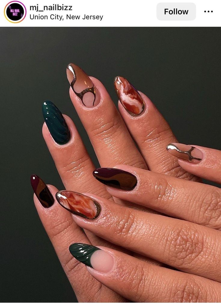 Chic Nail Design Blending Deep Jewel Tones and Earthy Shades with Unique Patterns