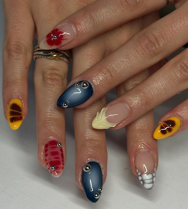 Vibrant and Artistic Nail Design with Unique Patterns and Decorative Accents.