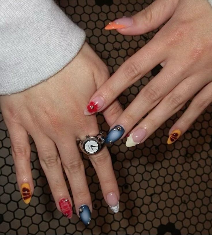 Eclectic Colorful Nail Designs with Patterns and Playful Accents