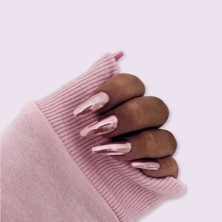 Chic Almond-Shaped Nails with Glossy Soft Pink Finish, Perfectly Paired with Cozy Knitted Sleeves.