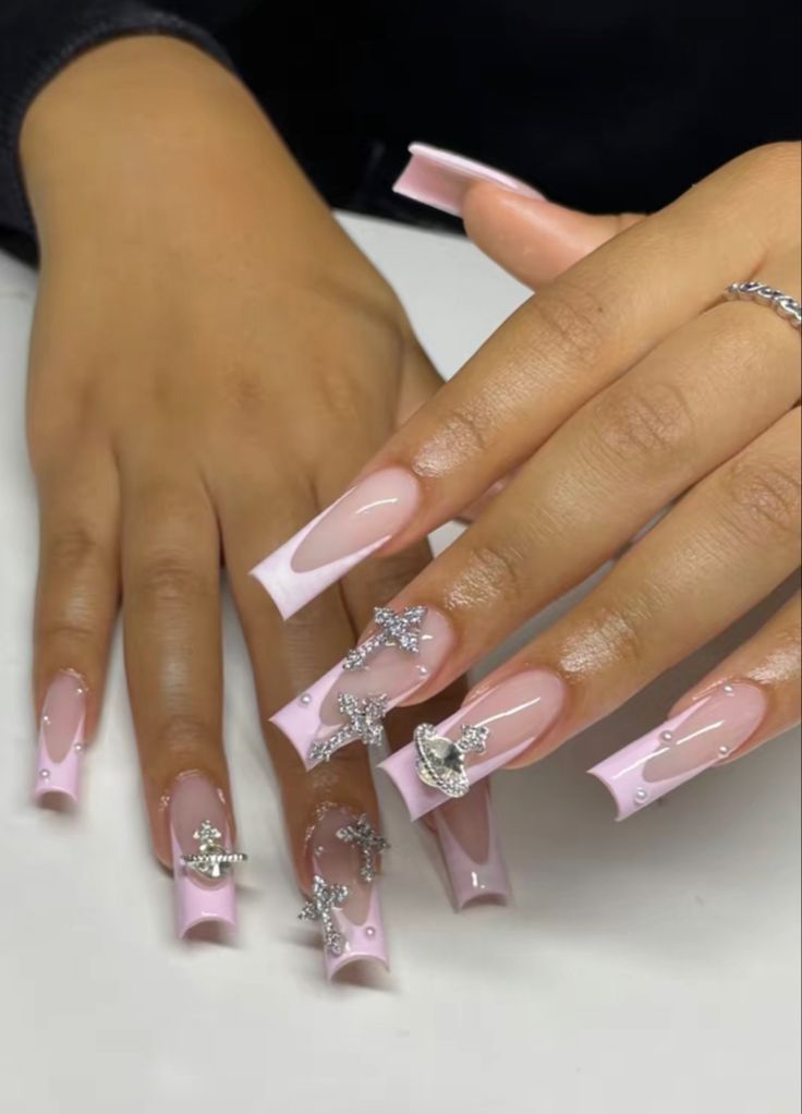 Chic Elegant Acrylic Nails: A Sophisticated Blend of Soft Pink and Nude with Glamorous Rhinestone Embellishments.