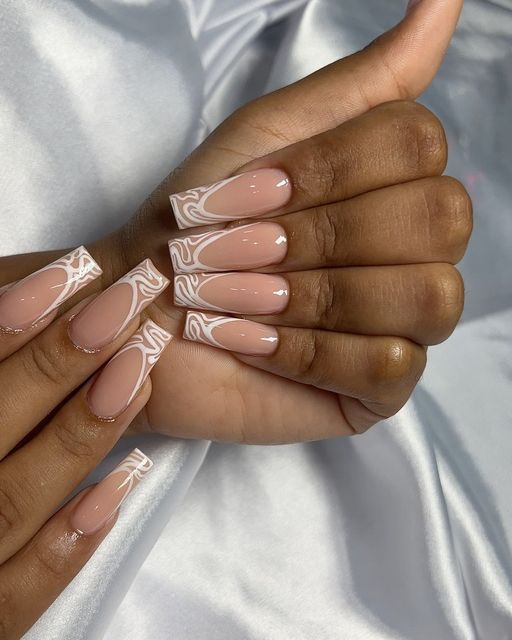 Sophisticated Nude and White Marble Nail Design on Modern Square-Shaped Nails.