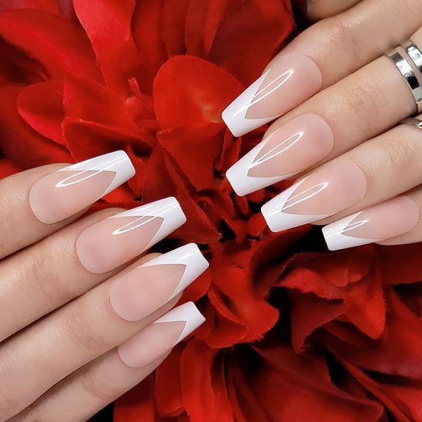 Chic Elegant French Tip Nails with Geometric Diagonal Lines and Soft Nude Base.