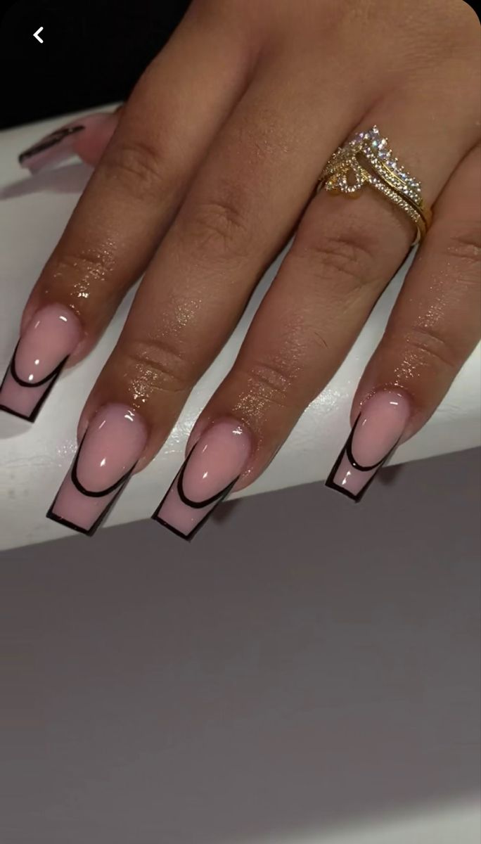 Chic Soft Pink Nail Design with Bold Black Outlines for a Modern Elegant Look