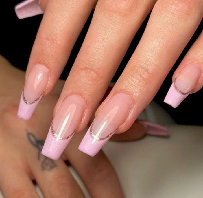 Chic Ombre Nail Design: Soft Pink to Lavender with Elegant Silver Accents.