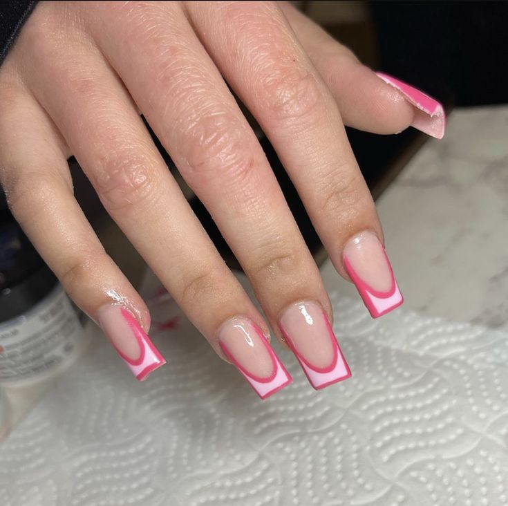 Chic Nail Design: Soft Pink and Fuchsia with Bold Outline for Versatile Elegance.