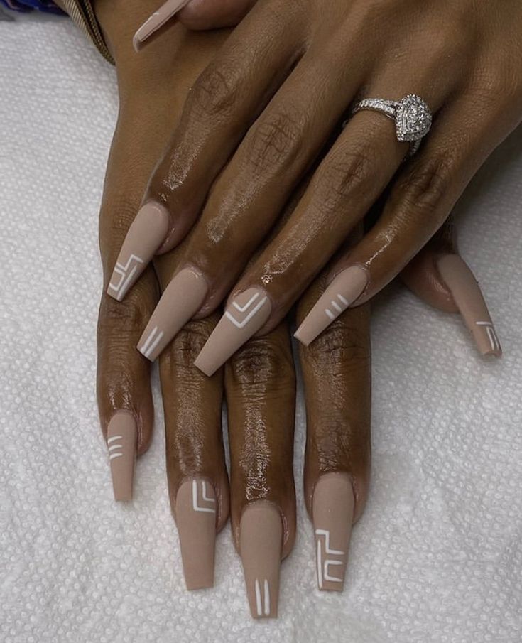 Modern Chic: Elegant Nude Acrylic Nails with Geometric White Designs