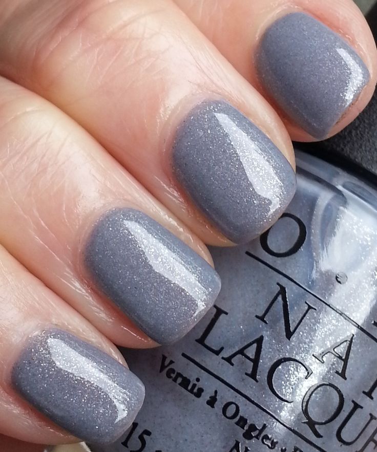 Elegant Gray Nails with Glossy Finish and Subtle Shimmer for Chic Versatility.