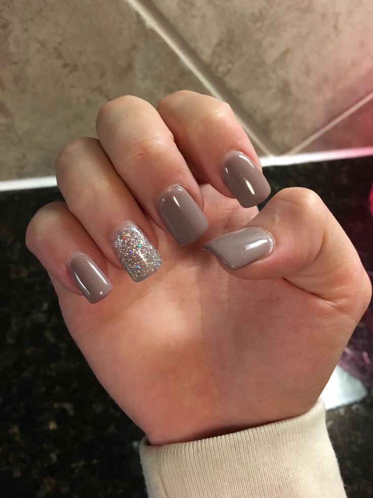 Chic Gray Nail Design with Dazzling Silver Glitter Accent.