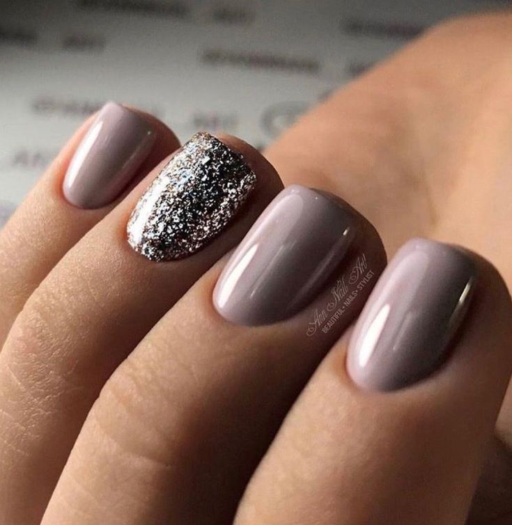 Sophisticated Mauve Nail Design with Glittery Accent for Every Occasion