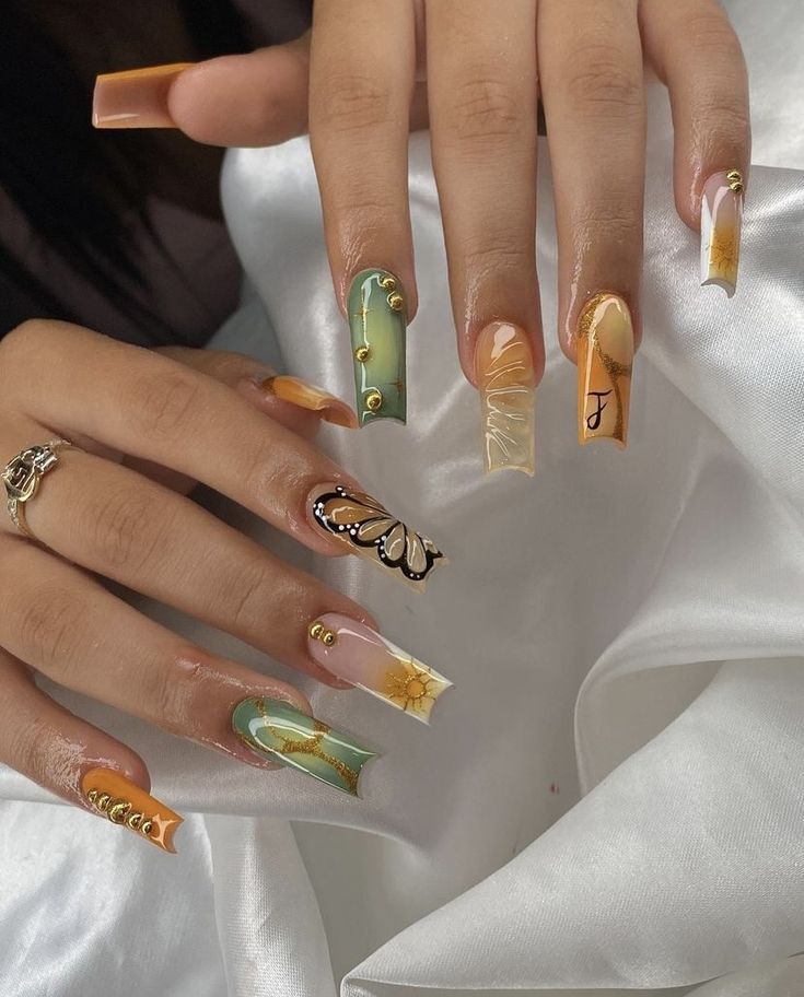 Playful Elegance: Artistic Pastel Nail Design with Unique Patterns and Luxurious Accents.