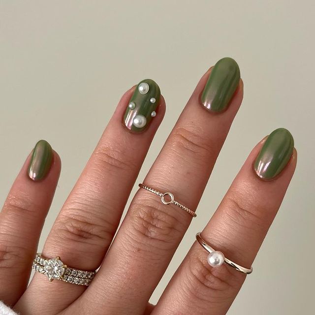 Chic Olive Green Nail Design with Glossy Finish and Elegant Pearl Accents.