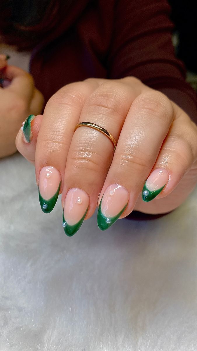 Chic Glossy Nude Nails with Dark Green Tips for Sophisticated Elegance.