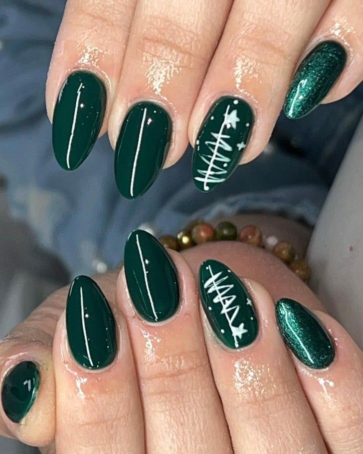 Sophisticated Green Nail Design with Glossy and Shimmery Finishes, Featuring Modern White Line Art and Playful Accents.