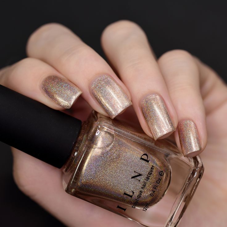 Glamorous Golden-Brown Holographic Nail Design for Everyday and Special Occasions.