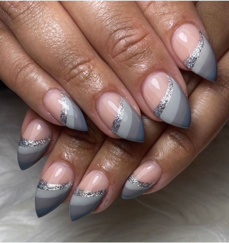 Sophisticated Stiletto Nails with Modern Gradient and Glam Metallic Accents