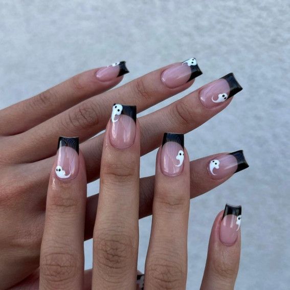 Chic Black-Tipped French Nails with Artistic Yin-Yang Symbols for a Stylish Twist.