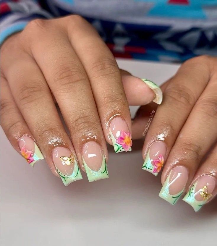 Whimsical Floral Nail Design in Soft Mint Green and Nude Tones