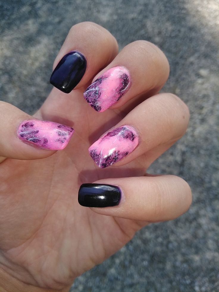 Bold Artistic Nail Design: Vibrant Black and Pink Gradient with Striking Marble Accents