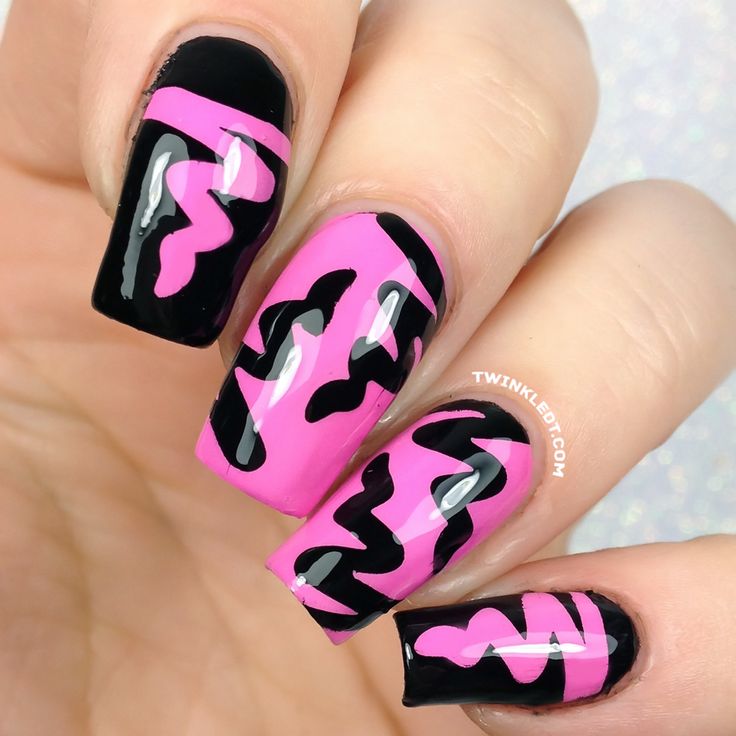 Bold Black and Pink Swirl Nail Design for a Striking Statement Look.