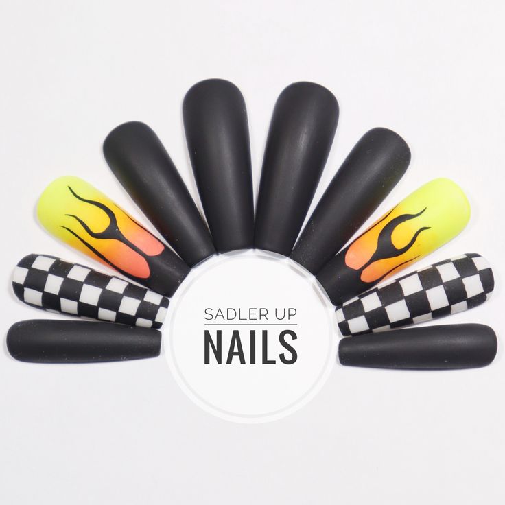 Vibrant Nail Design: Bold Matte and Glossy Finishes with Intricate Flame Patterns and Edgy Checkerboard Twist.