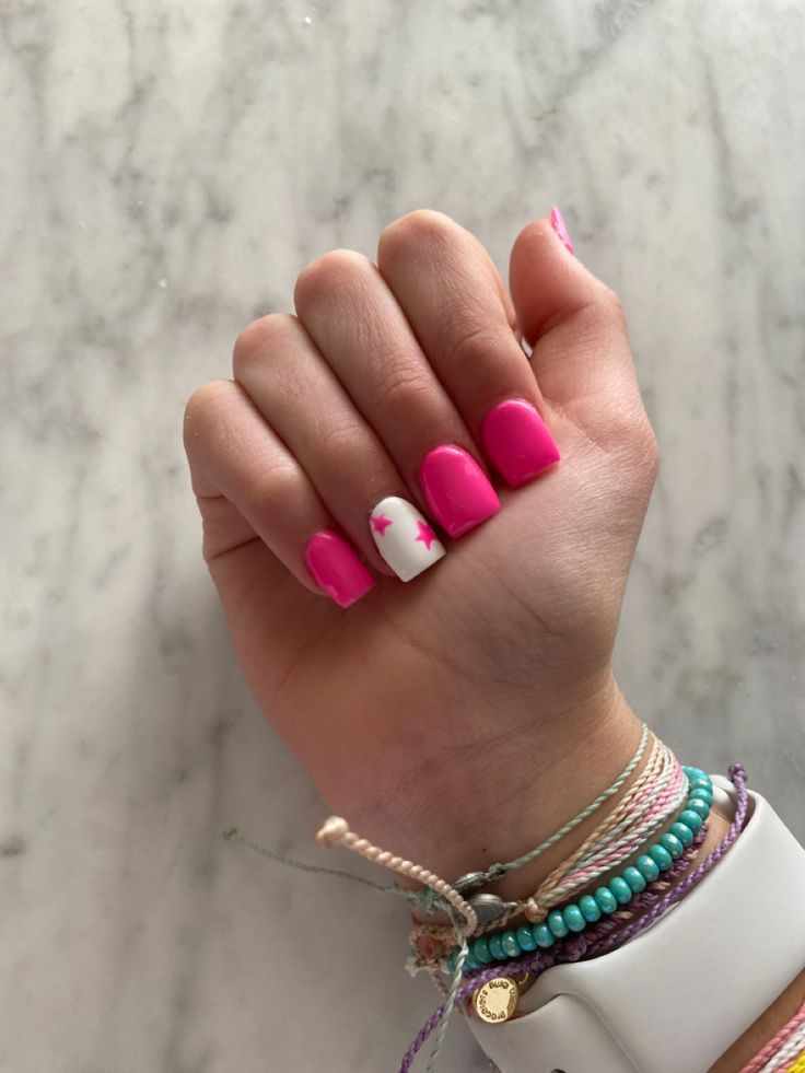 Trendy Vibrant Pink Nail Design with Playful Star Accent