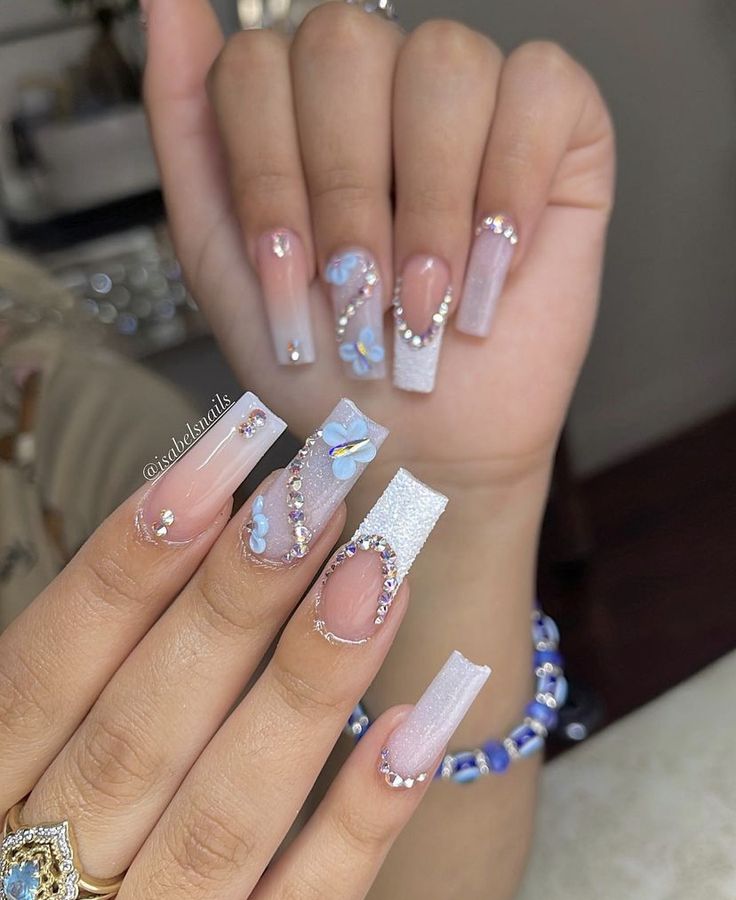 Elegant Pastel Nail Design with Intricate Floral and Rhinestone Embellishments