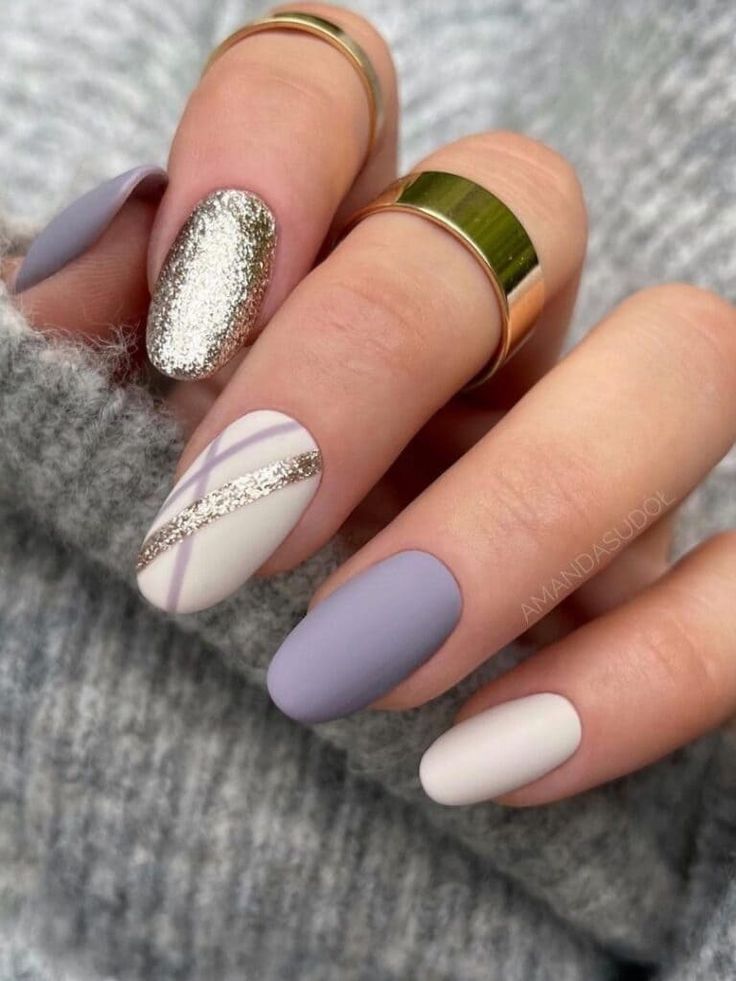 Chic Lavender and Neutral Nail Design with Shimmering Silver Accent.