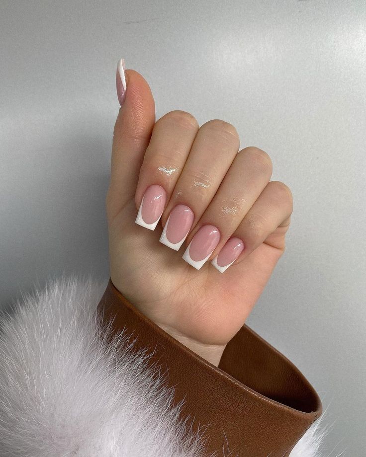 Sophisticated Soft Pink and White Oval Nail Design for Any Occasion