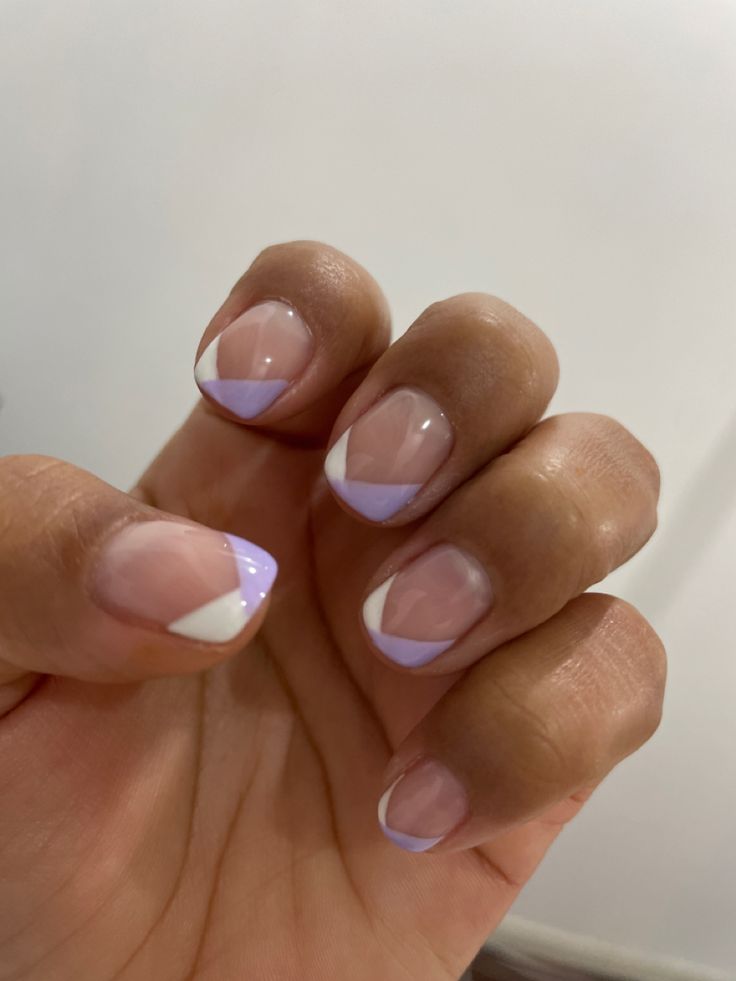 Modern French Manicure: Playful Pastel Geometric Triangular Tips.