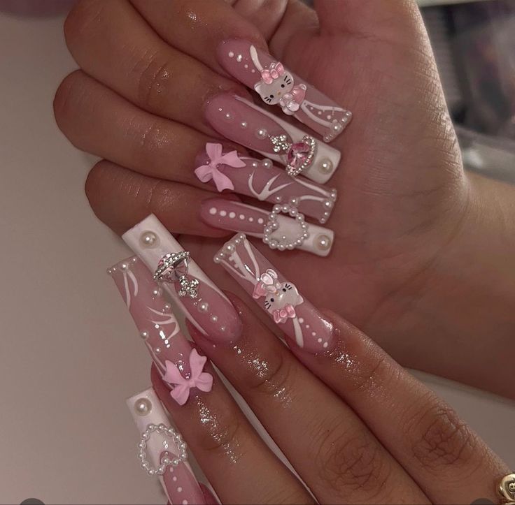 Whimsical Elegance: Charming Soft Pink Nail Design with Intricate Embellishments