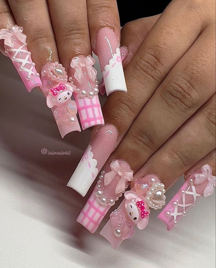 Charming Playful Pink Nail Design with 3D Elements and Unique Embellishments