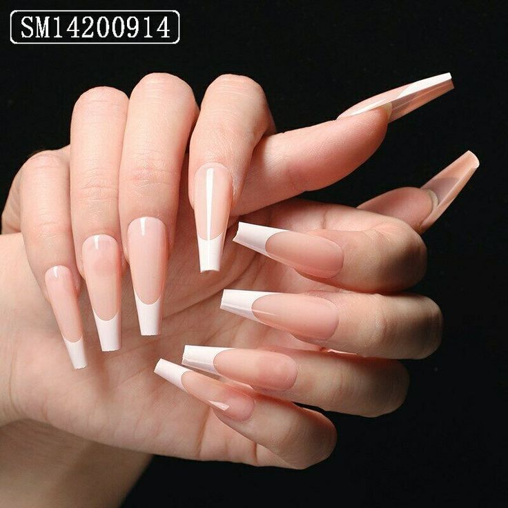 Chic Long Pointed Nail Design: Clear Pink Base with Sleek White Tips for a Bold Statement.