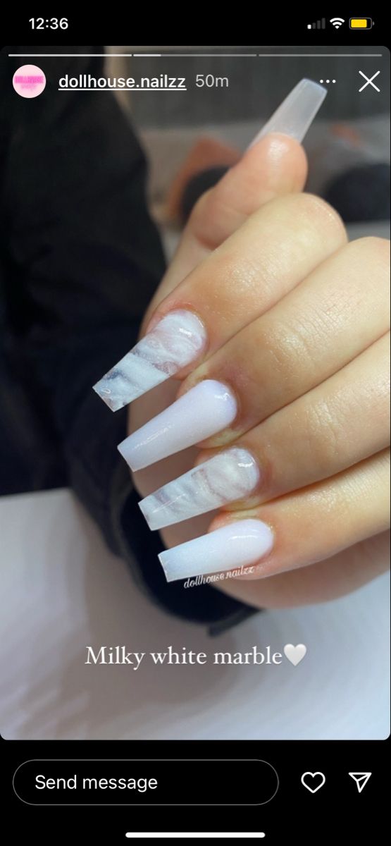 Elegant Milky White Marble Nail Design with Glossy Finish and Artistic Appeal