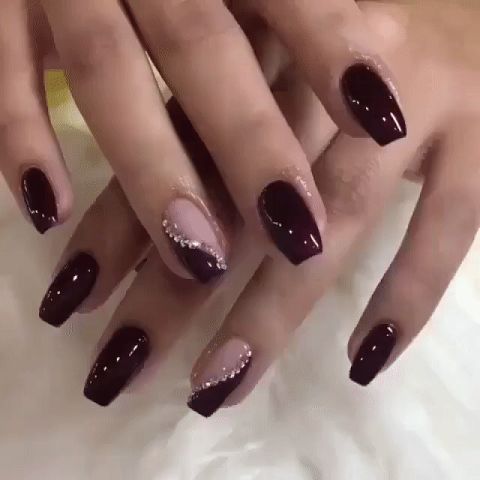 Sophisticated Burgundy and Nude Nail Design with Glossy, Matte Finishes and Rhinestones.