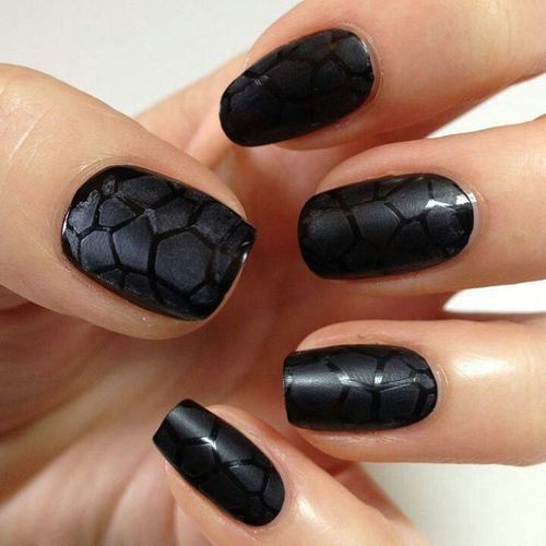 Bold Textured Black Nail Design with Cracked Finish for Unique Elegance.