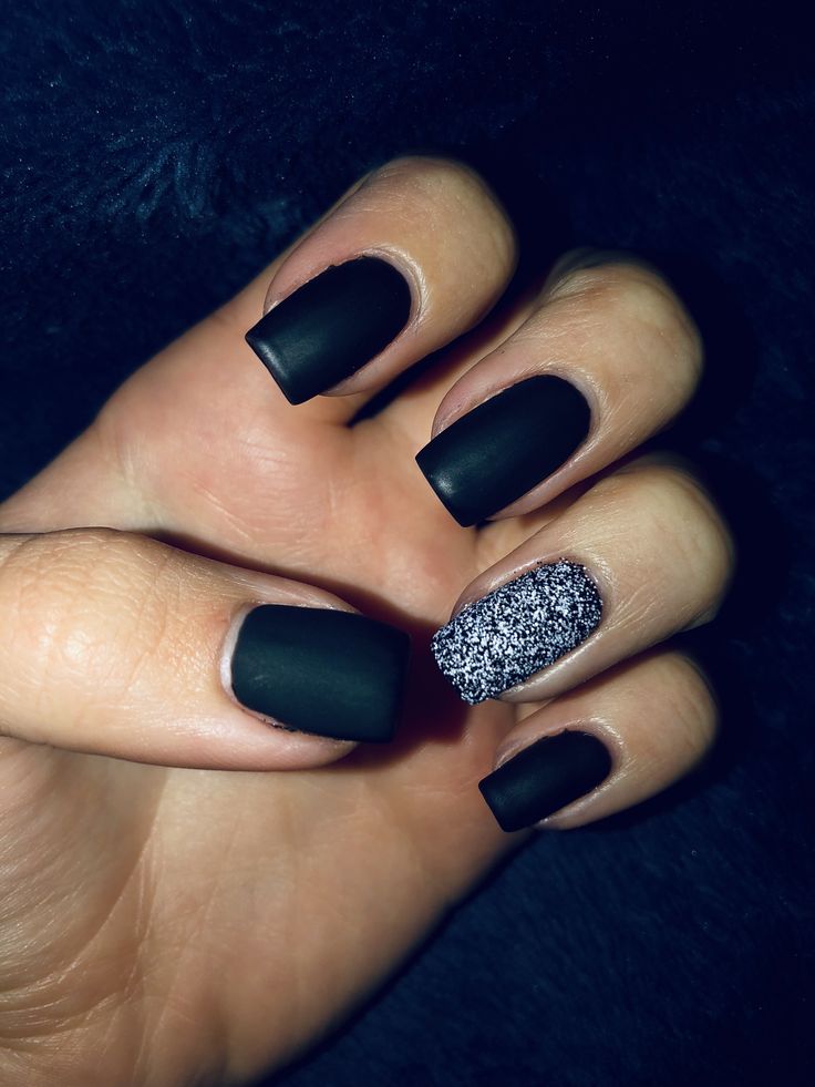 Chic Matte Black Nails with Striking Silver Glitter Accent