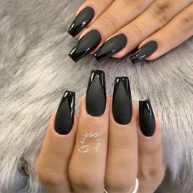 Edgy Sophistication: Stunning Black Almond-Shaped Nails with High-Gloss Finish