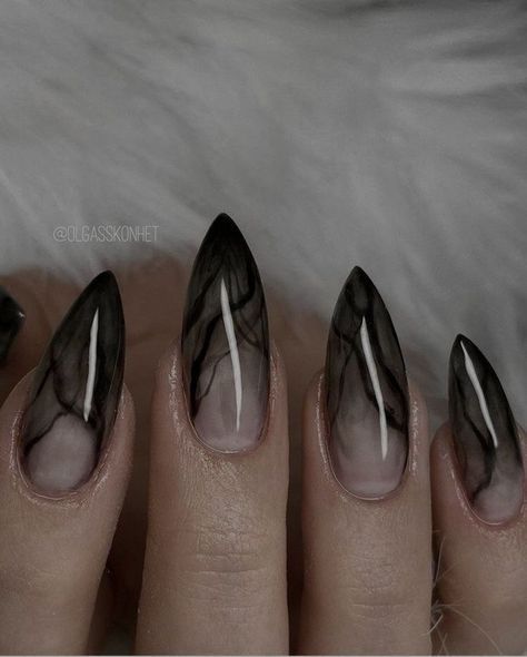 Chic Stiletto Nails: Stunning Marble Effect in Transparent and Opaque Black Hues for a Sophisticated Statement.