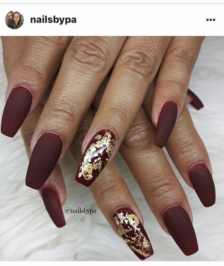 Sophisticated Matte Burgundy Nails Accentuated with Glamorous Gold Foil.