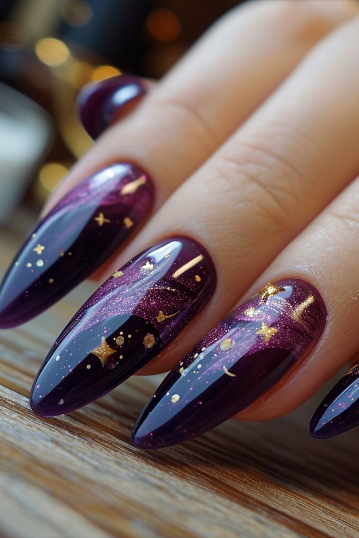 Cosmic Ombre Galaxy Nails: Bold Deep Purple with Gold Accents and Star Motifs